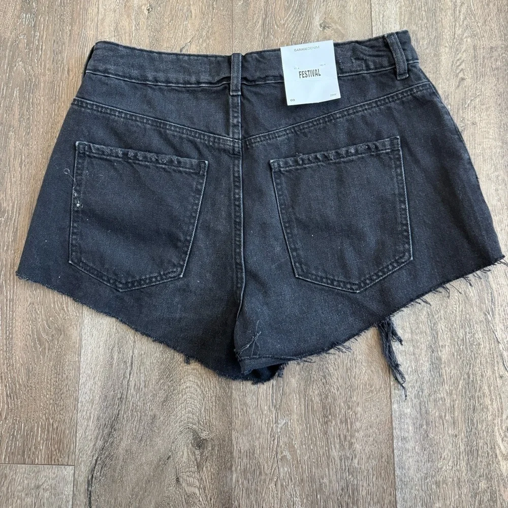Garage new with tags, Black Distressed Denim Shorts, women’s size 9